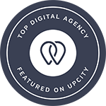 A circular badge stating "TOP DIGITAL AGENCY FEATURED ON UPCITY" with an interconnected pin icon.